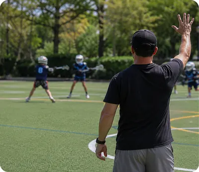 Coach
                        guiding players